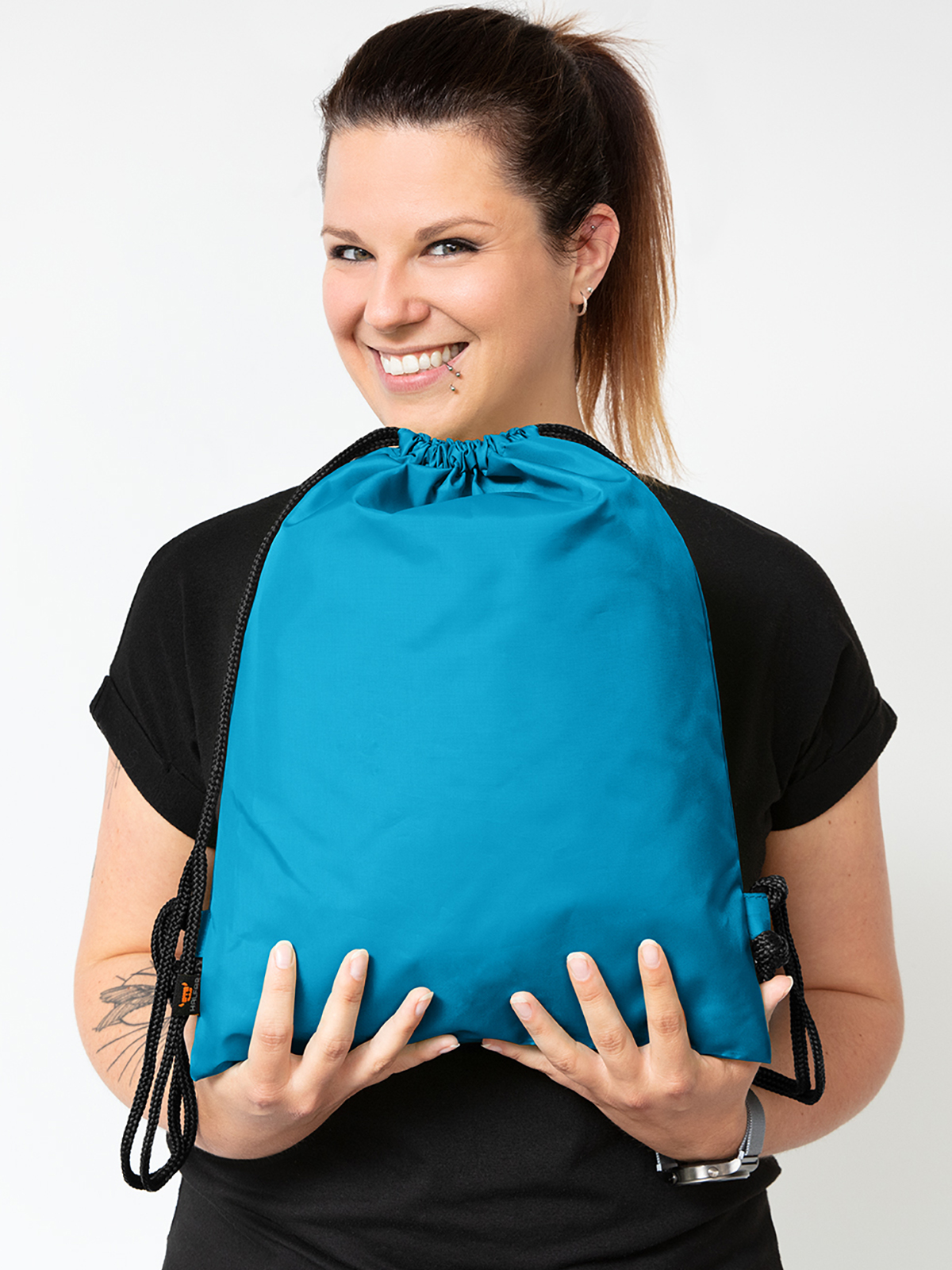 taffeta backpack SPORT cyan featuring a model