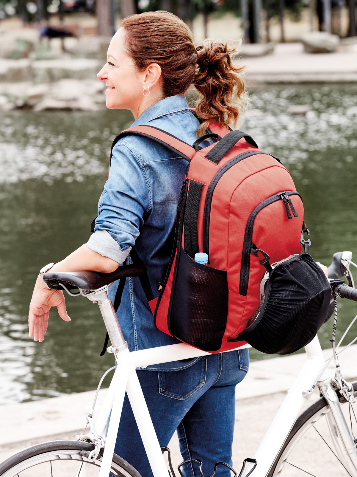 backpack TEAM red featuring a model