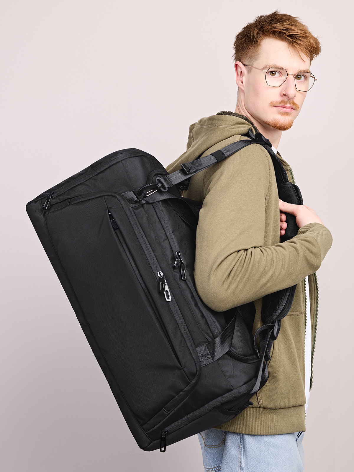 sport/travel bag SOLID black featuring a model