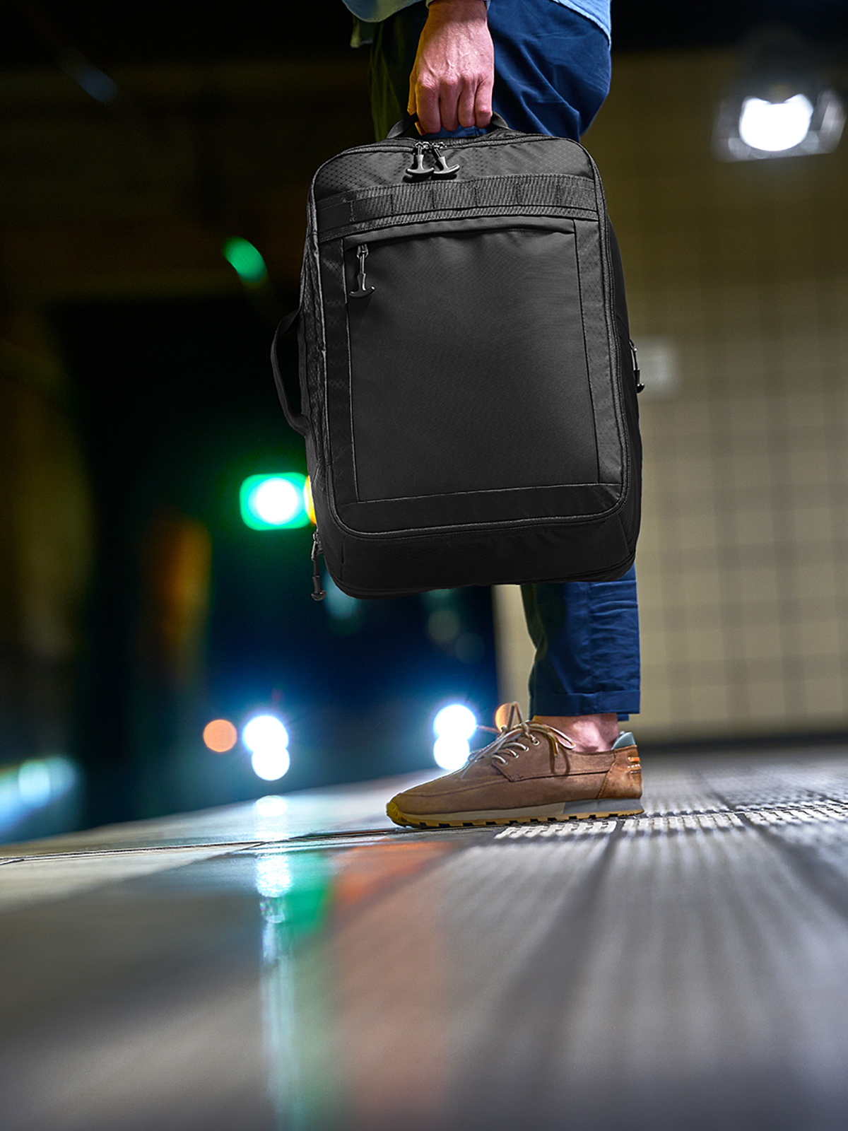 travel backpack ACTIVE black featuring a model