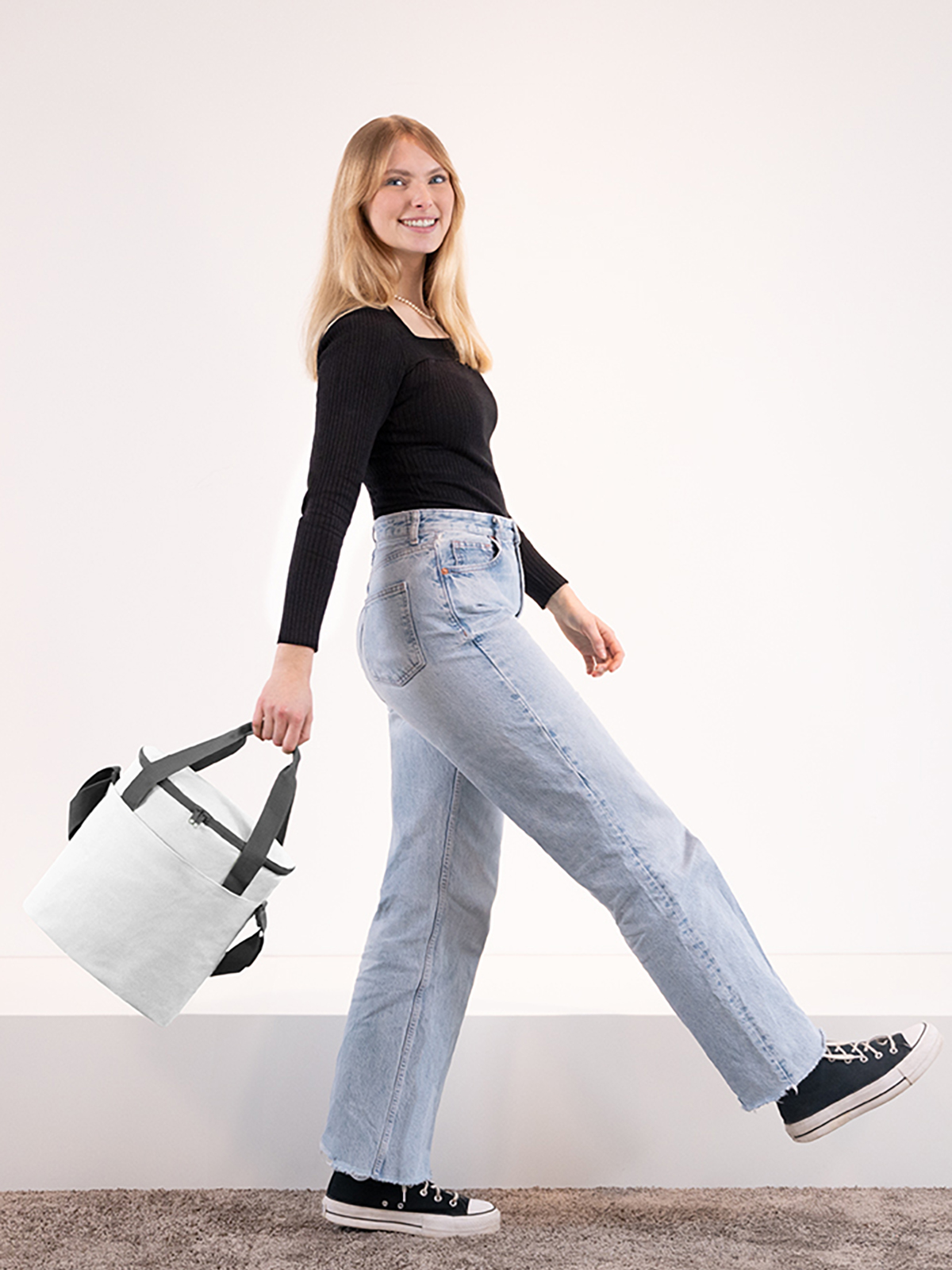 cool bag SOLUTION white featuring a model