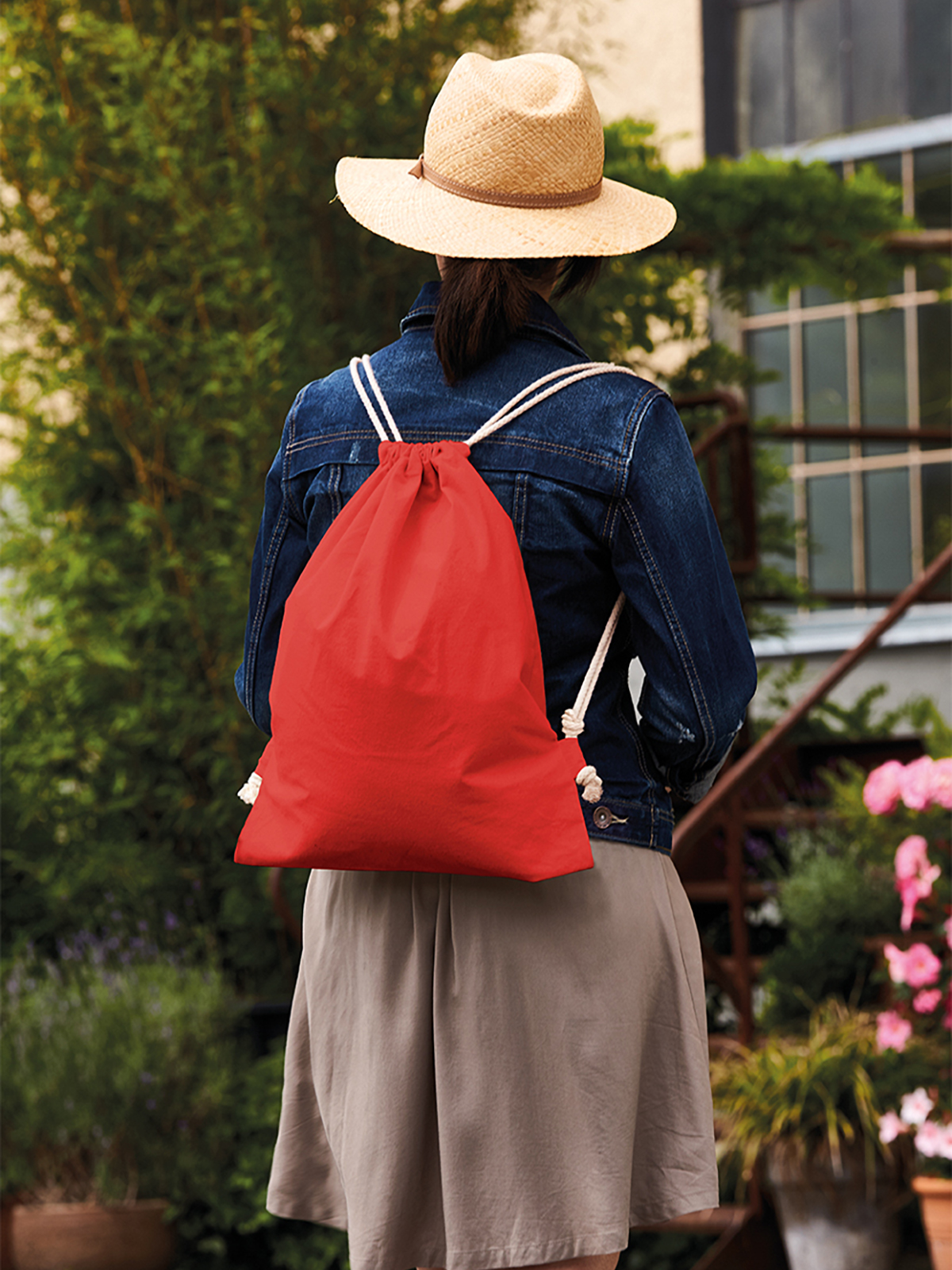 drawstring bag EARTH red featuring a model