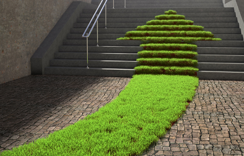 grüner nachhaltiger Weg mit Pfeil eine Treppe hoch