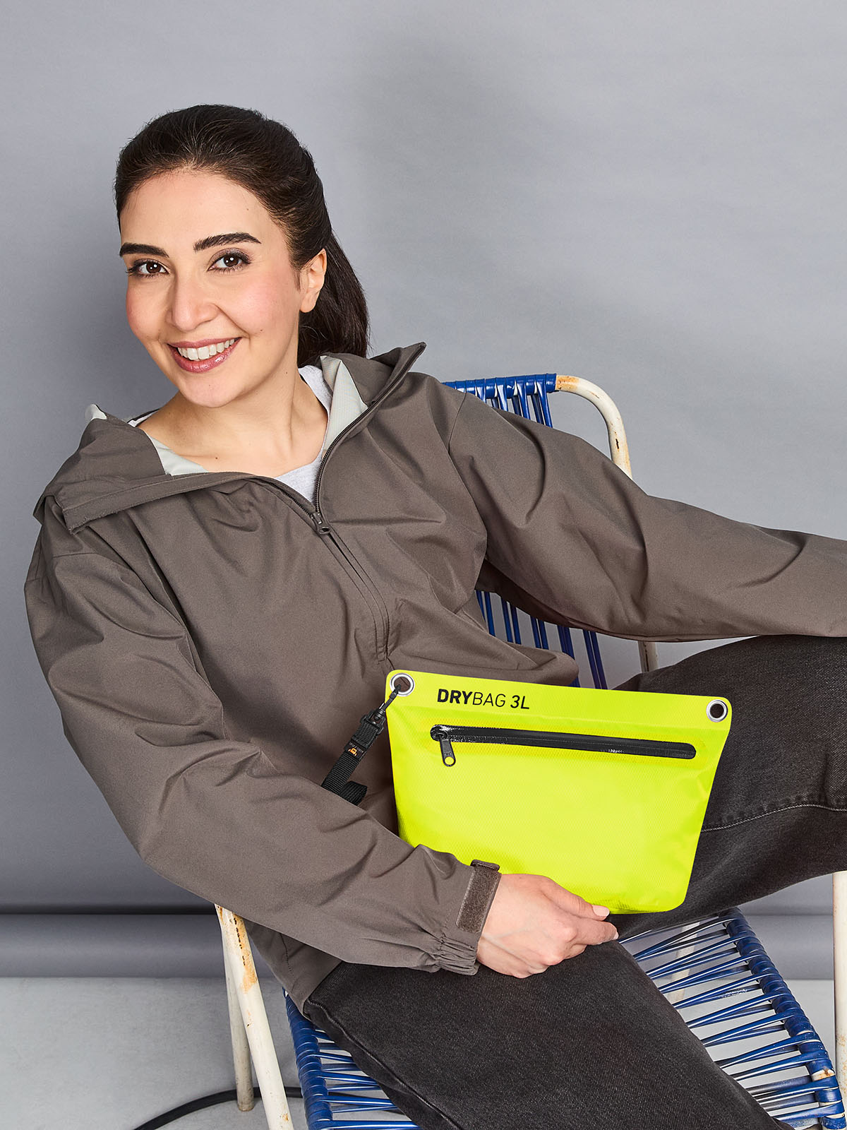 zipper bag DRYBAG neon-yellow featuring a model
