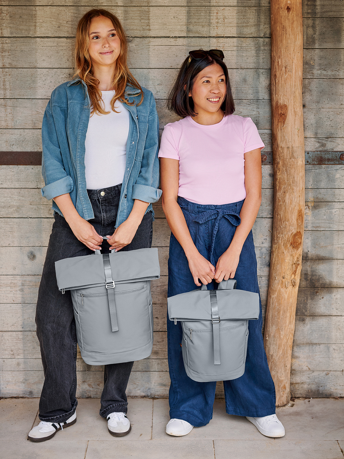 laptop backpack STAR and backpack STAR S ice-blue held by models