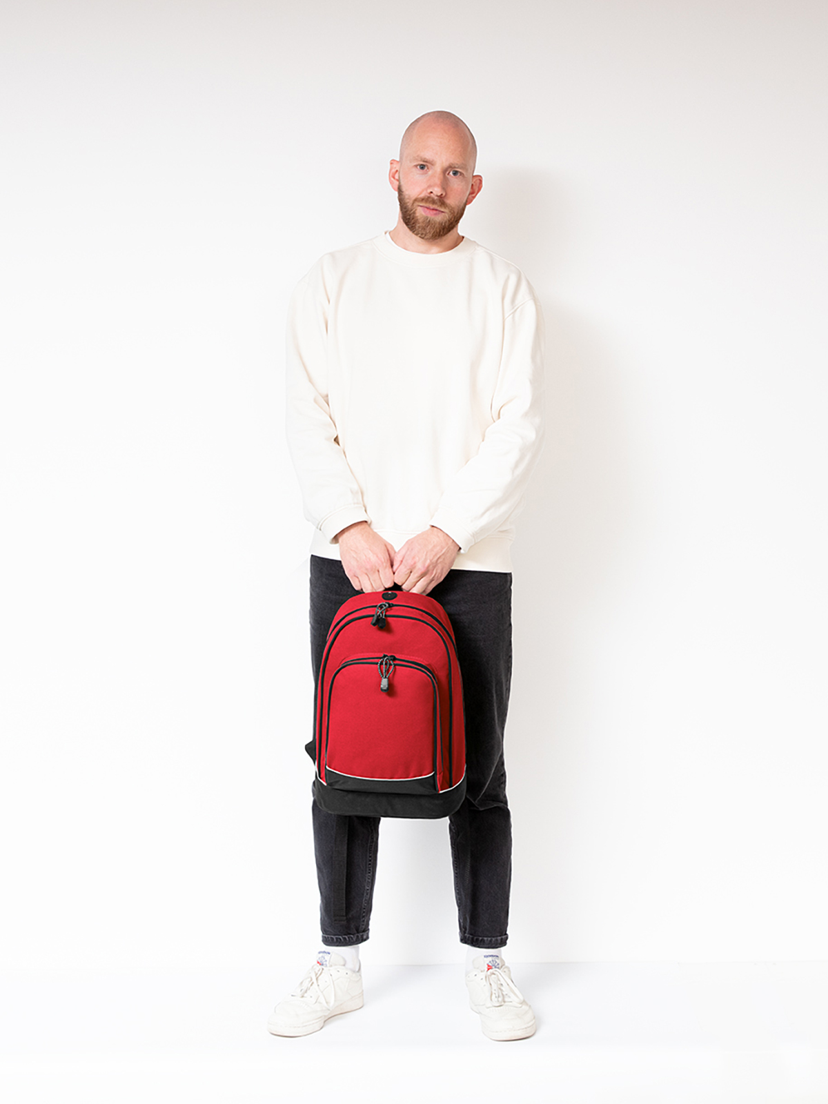 daypack CITY red featuring a model
