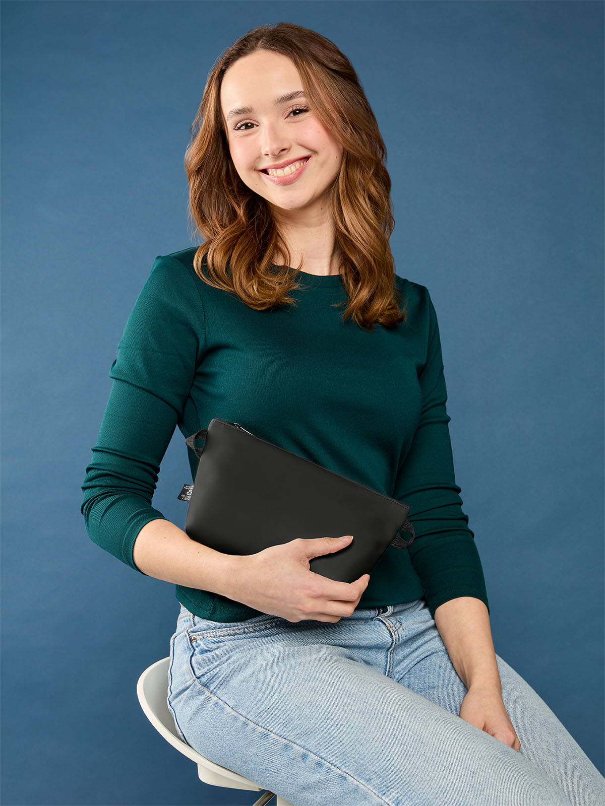 zipper bag PURE in black, shown with model