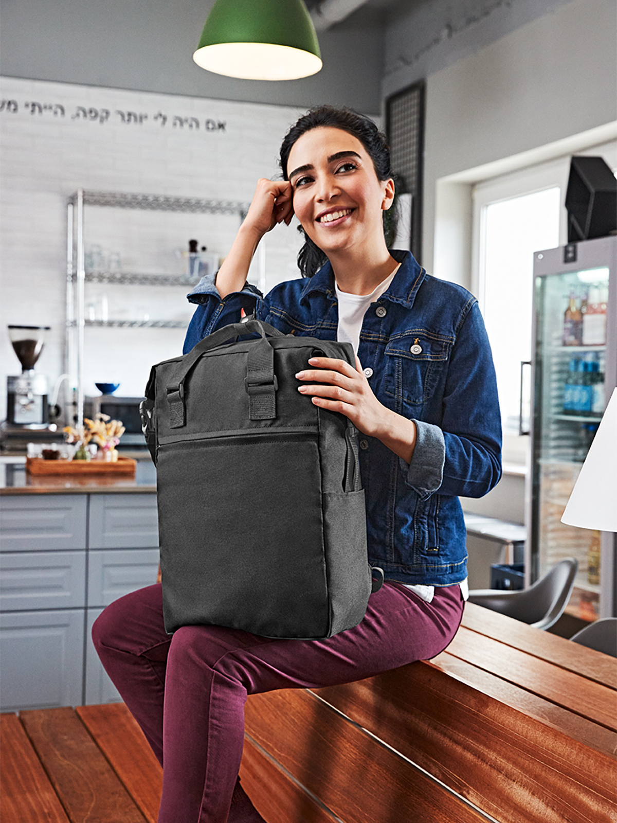 notebook backpack DAILY black featuring a model