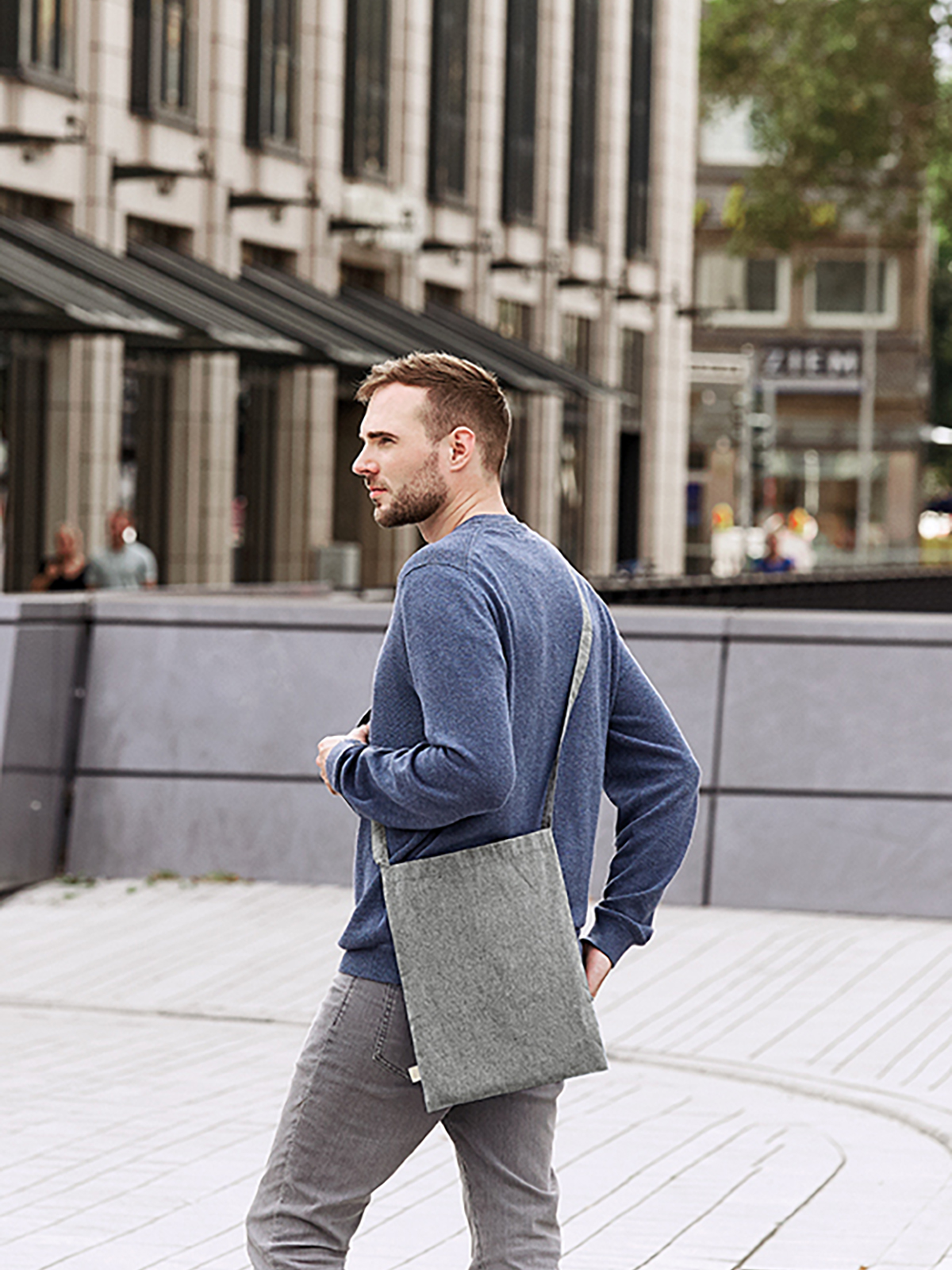 tote bag PLANET light-grey featuring a model