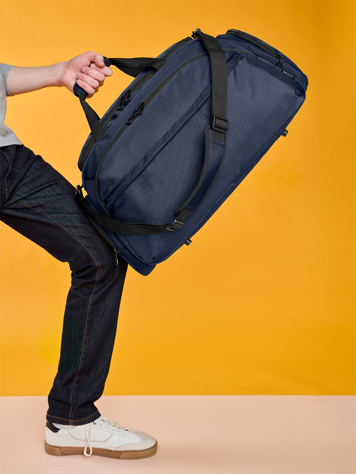 sport/travel bag MISSION in navy, shown with model