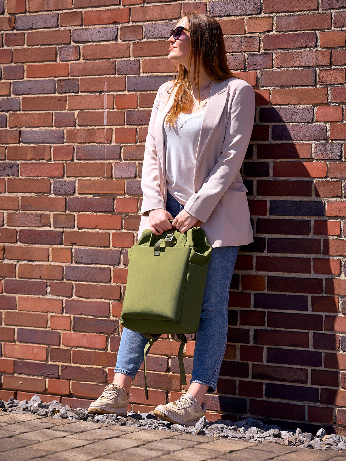 backpack METRO green featuring a model