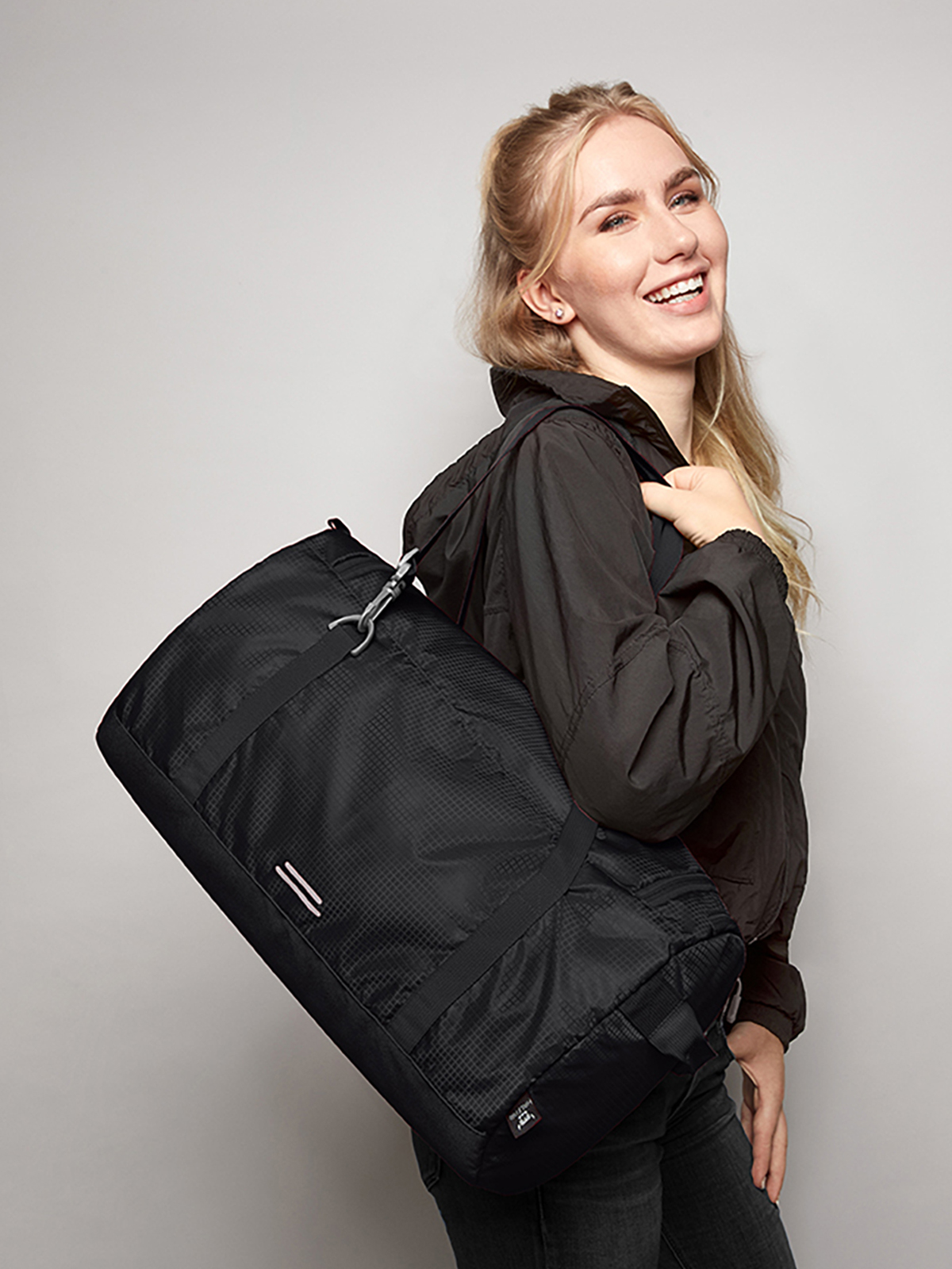 sports bag OUTDOOR black featuring a model