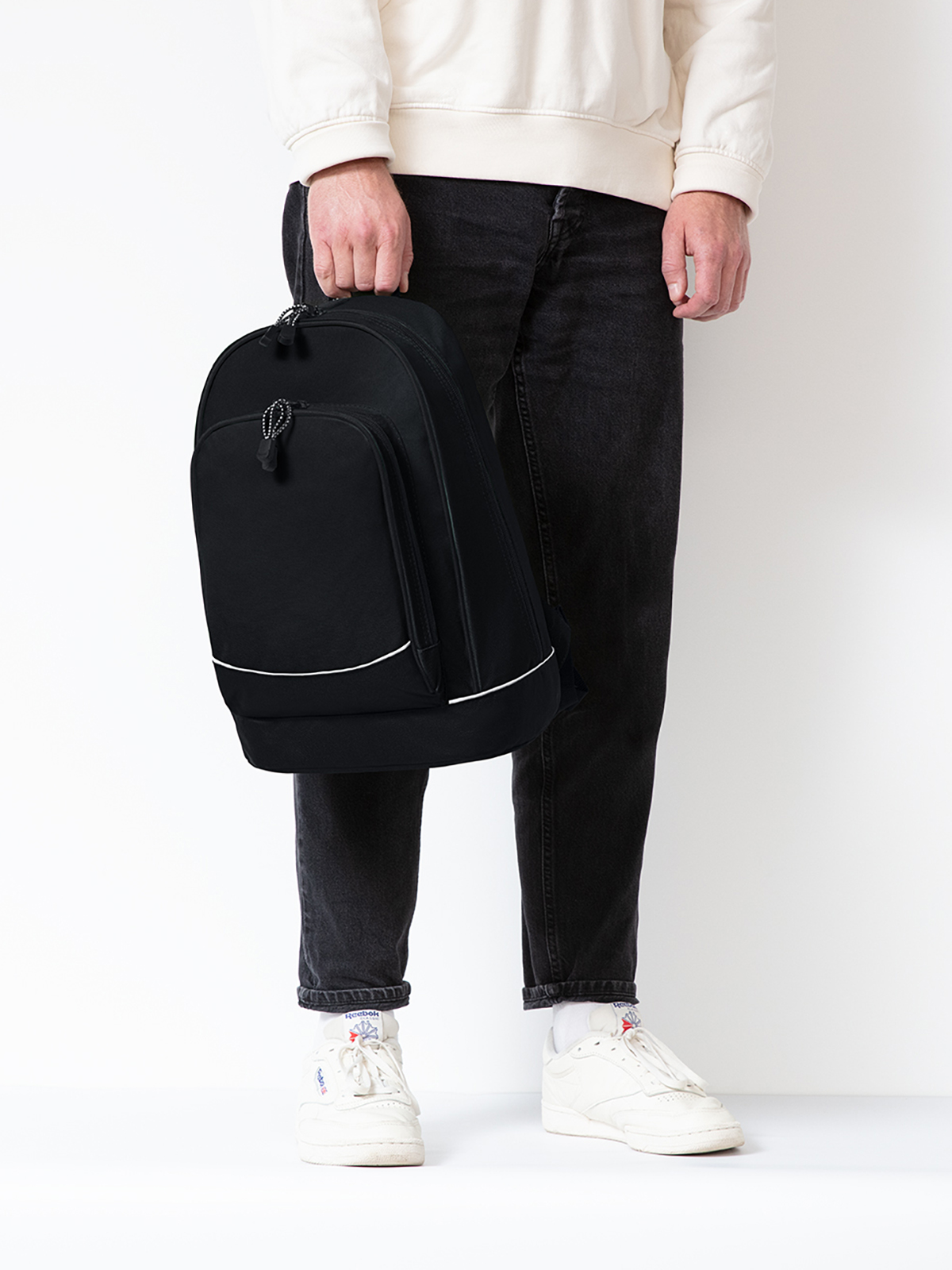 daypack CITY black featuring a model