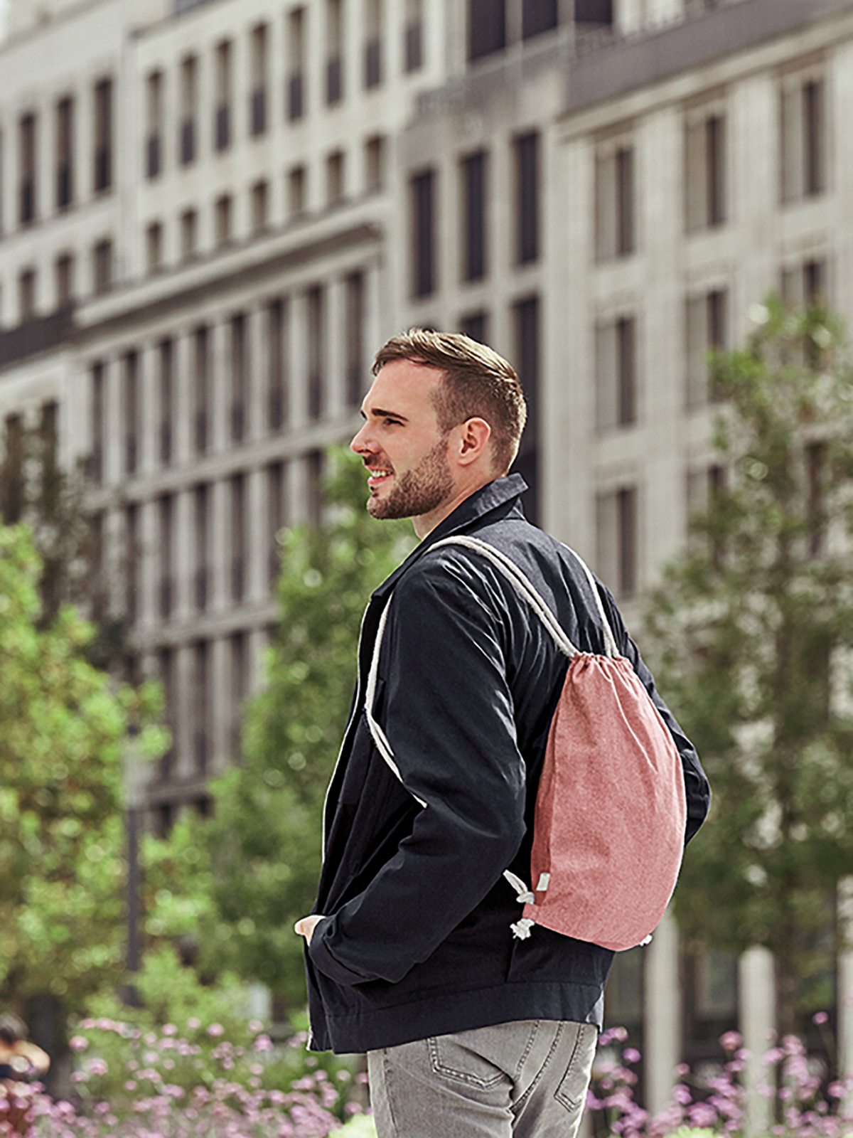 drawstring bag PLANET red featuring a model