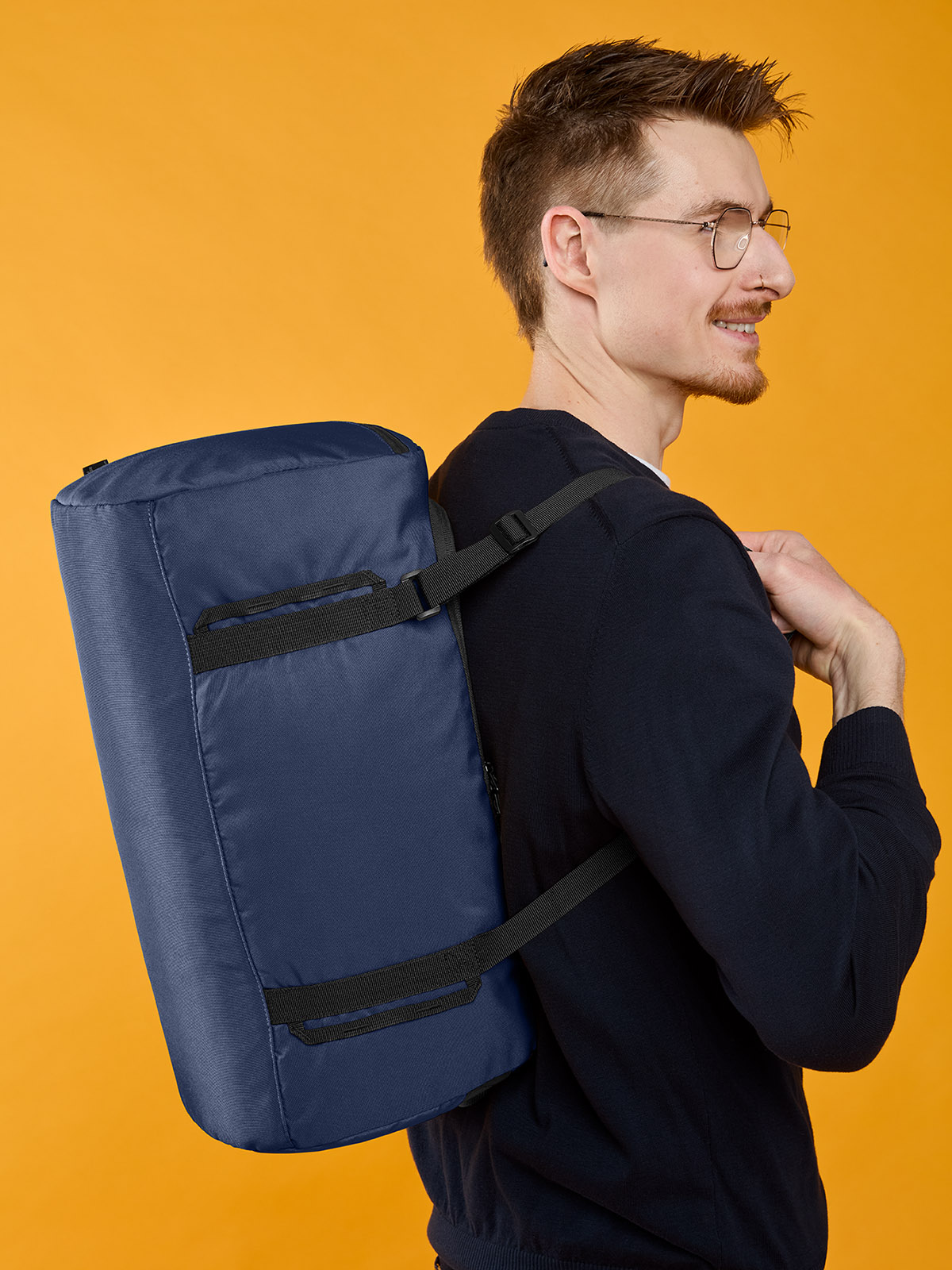 sport/travel bag LOOP in navy, shown with model