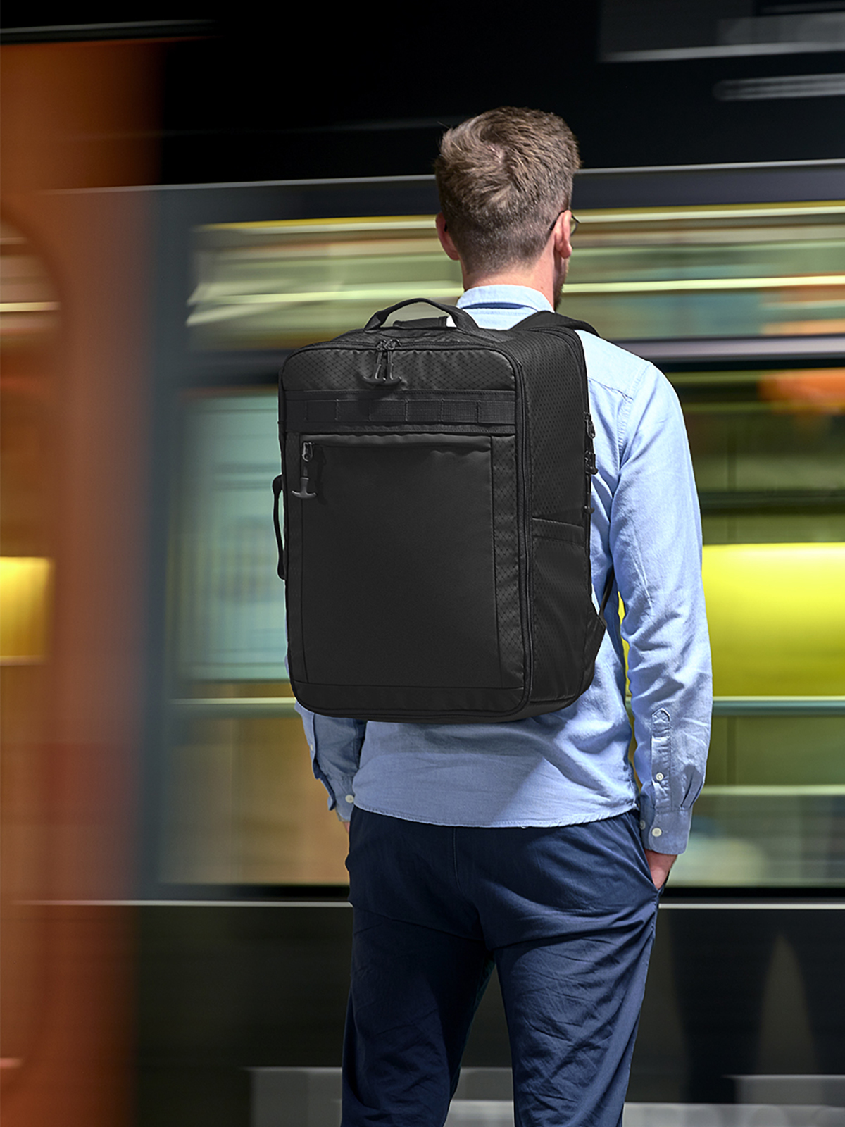 travel backpack ACTIVE black featuring a model
