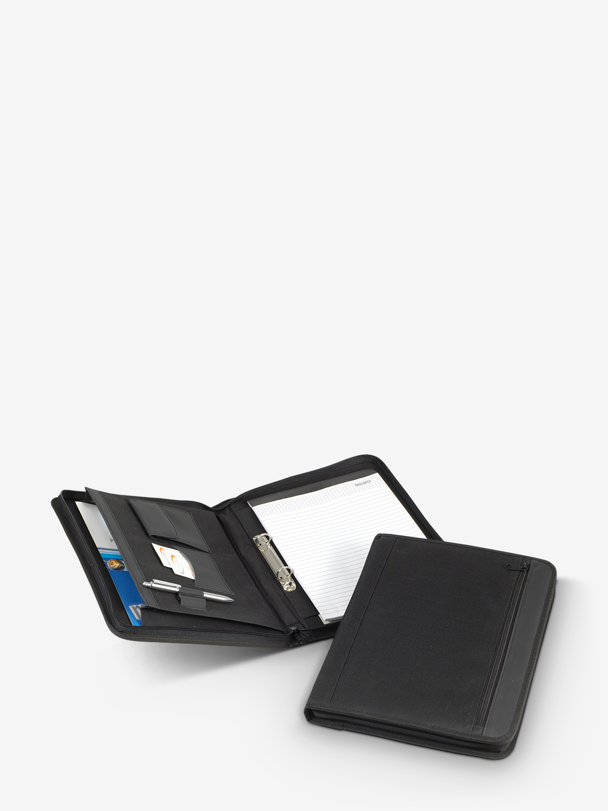 Schreibmappe offen und gefuellt