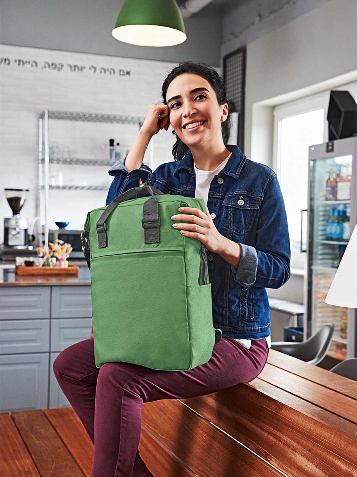notebook backpack DAILY green featuring a model