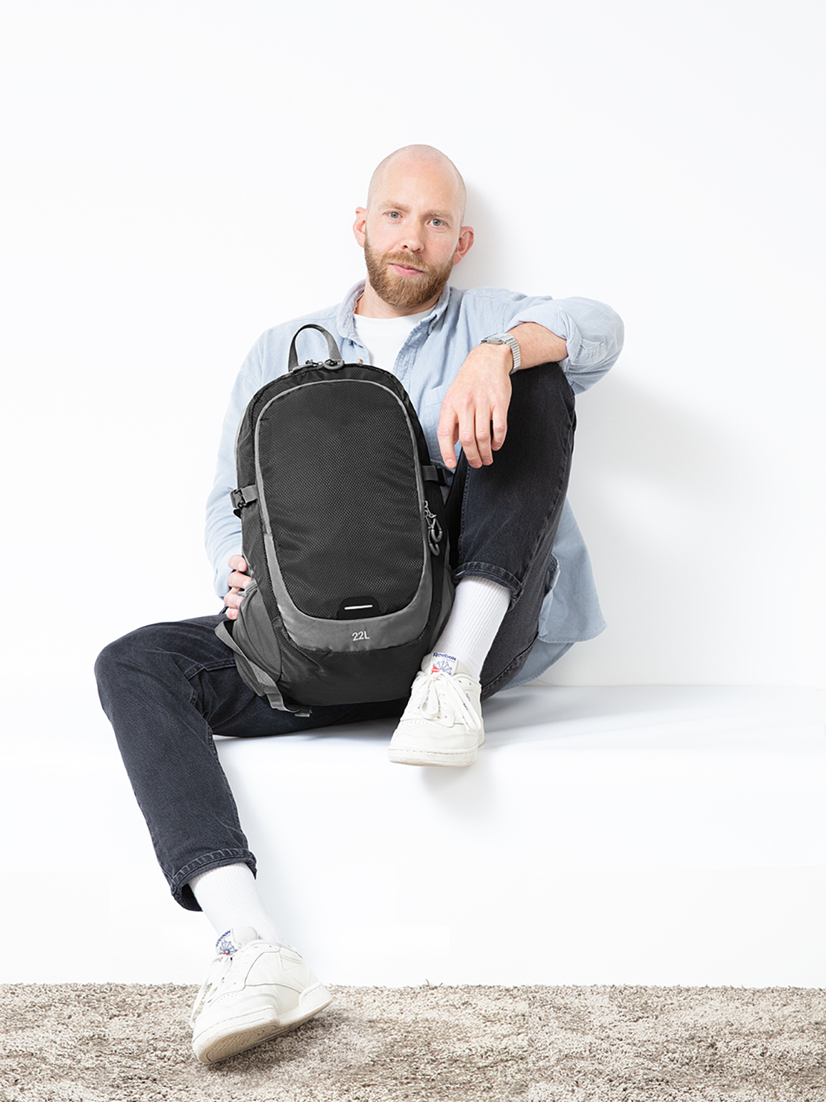 backpack STEP L black featuring a model