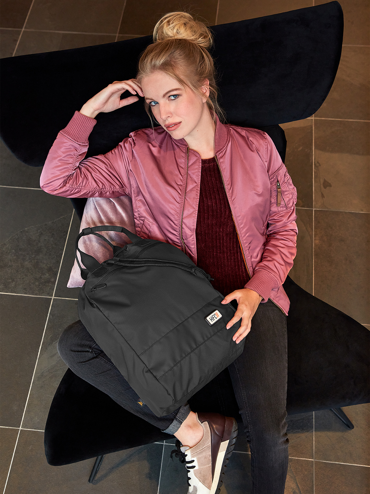 notebook backpack STAGE black featuring a model