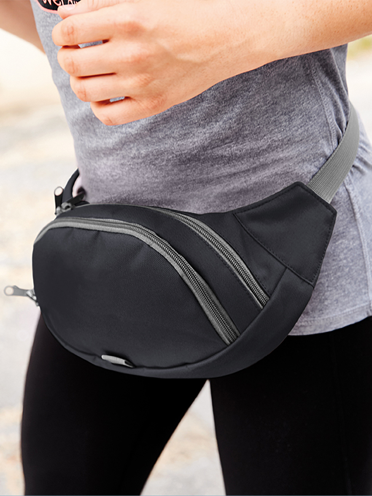 waist bag SOLUTION black featuring a model