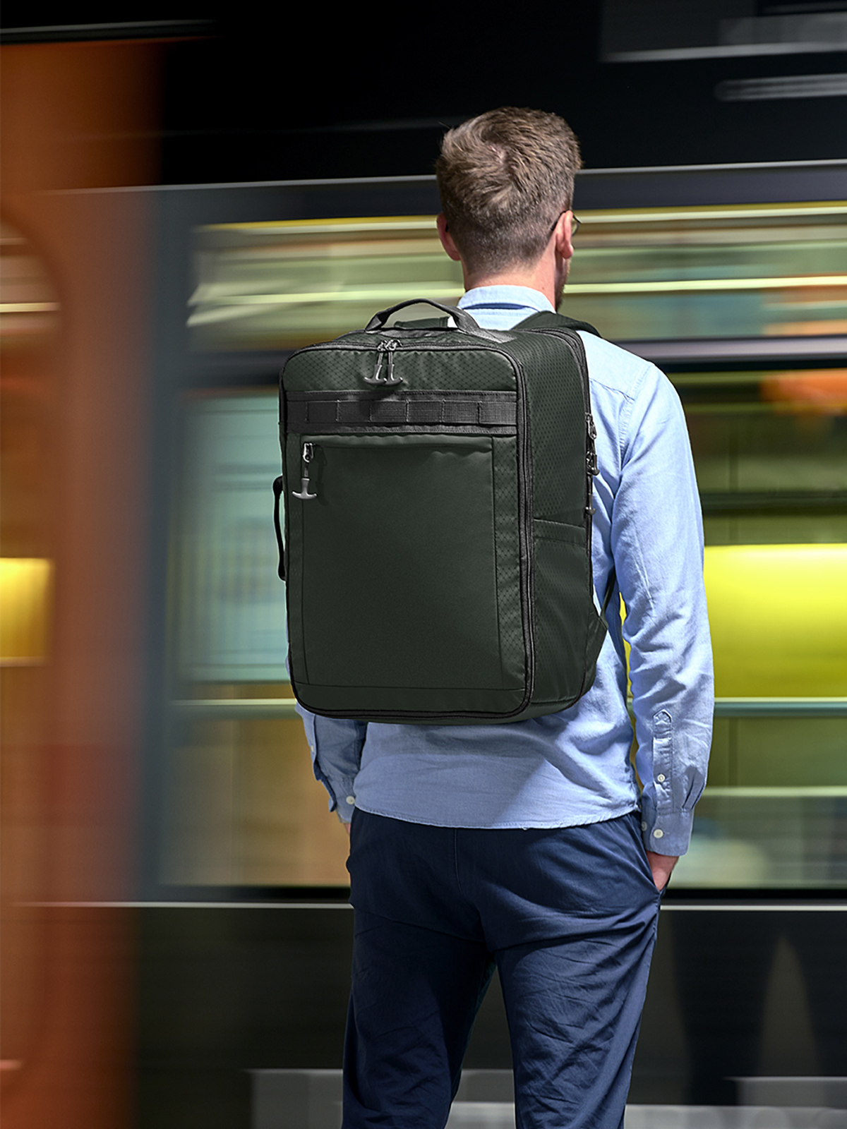 travel backpack ACTIVE dark-green featuring a model