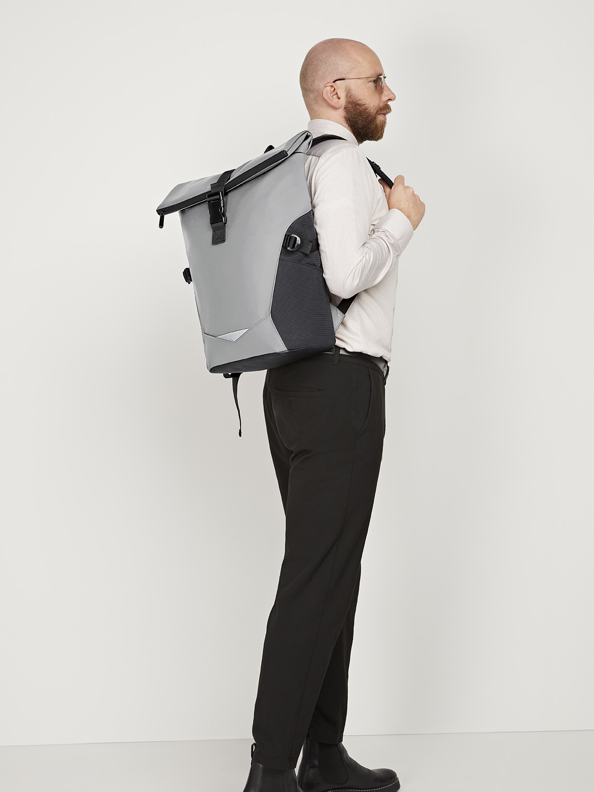 notebook backpack ORBIT in medium grey, lifestyle image with model