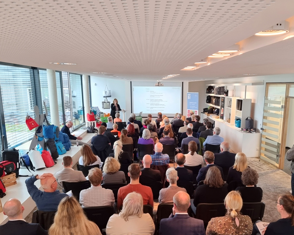 ÖKOPROFIT event at Halfar with audience and presentation on sustainability