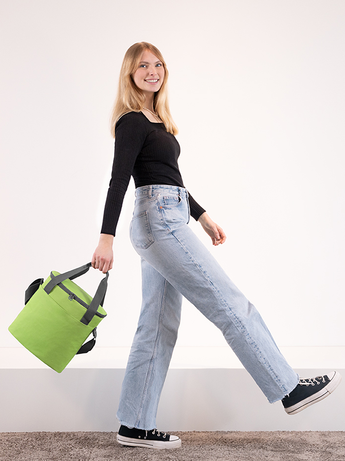 cool bag SOLUTION apple-green featuring a model
