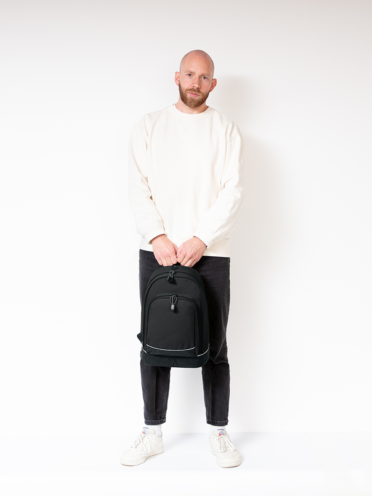 daypack CITY black featuring a model