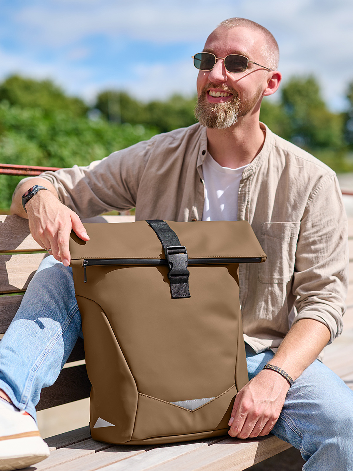 bike backpack ORBIT caramel featuring a model